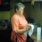 "This is Sue, probably getting ready to pick the meat off of about 10 chickens! I used them for chicken amd dumplings,one of our best sellers. Bless her heart! I was so picky, i didn't want any veins or anything left in the chicken I used! She complained a little but not much!" ~ Mama Peggy, May 21, 2010